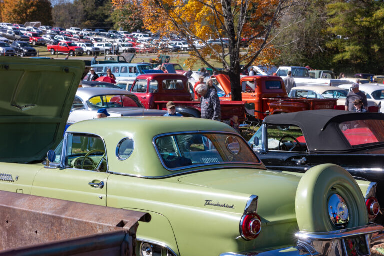 A classic Thunderbird painted green.